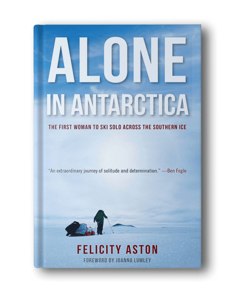 Cover of the book "Alone in Antarctica" by Felicity Aston, showing a lone figure skiing across icy terrain with the subtitle "The first woman to ski solo across the Southern Ice. A must-read for fans of hiking books for women.