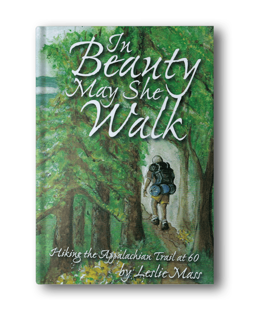 Book cover titled "In Beauty May She Walk: Hiking the Appalachian Trail at 60" by Leslie Mass, featuring an illustration of a hiker walking through a forest. Perfect for fans of hiking books for women.