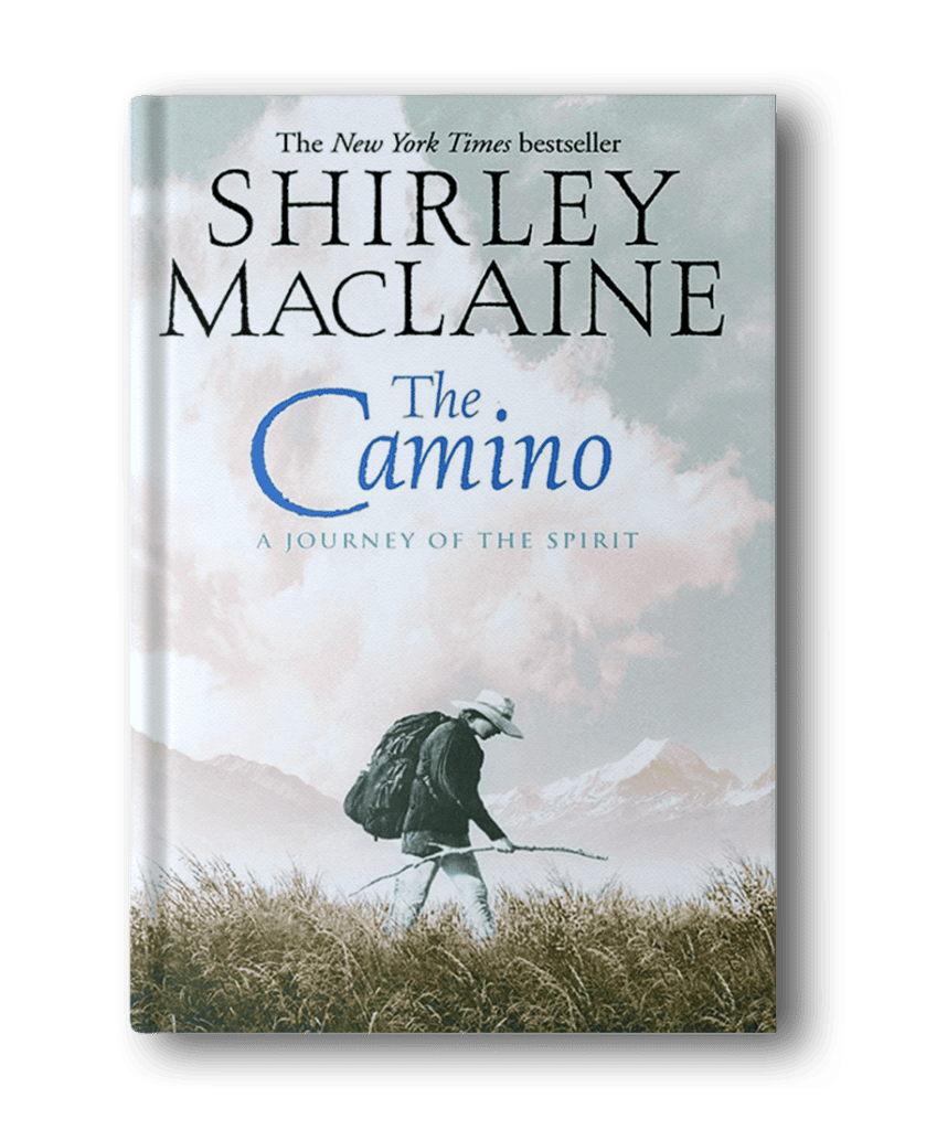 Cover of the book "The Camino: A Journey of the Spirit" by Shirley MacLaine. The cover depicts a person walking with a backpack against a backdrop of mountains and clouds, perfect for those seeking inspirational books for women or adventure books for women.