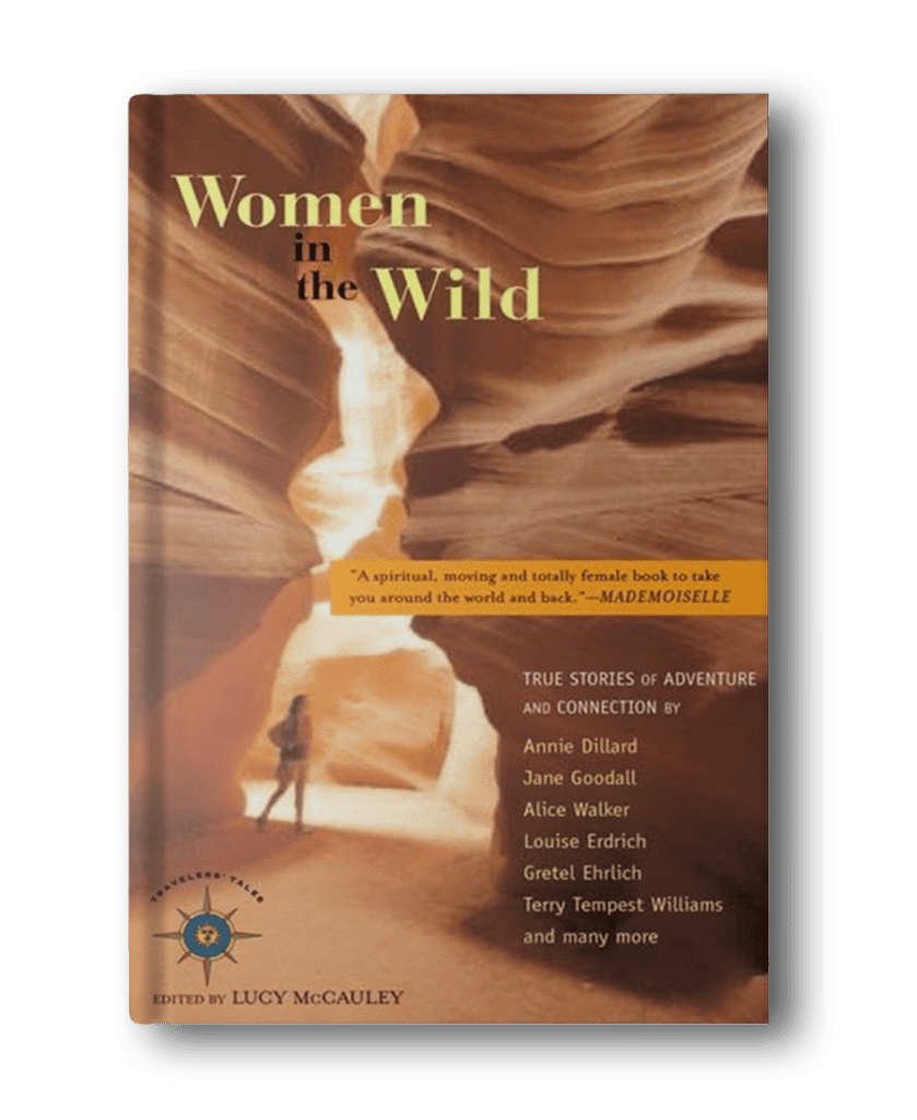 Book cover of 'Women in the Wild,' edited by Lucy McCauley. Featuring a canyon scene, this adventure book for women lists contributing authors including Annie Dillard, Jane Goodall, and Alice Walker.