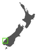 Silhouette map of New Zealand with a green box highlighting a region in the southwest of the South Island.